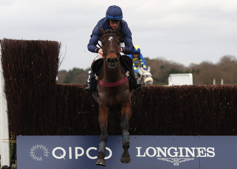 Djelo puts in another good leap on his way to victory