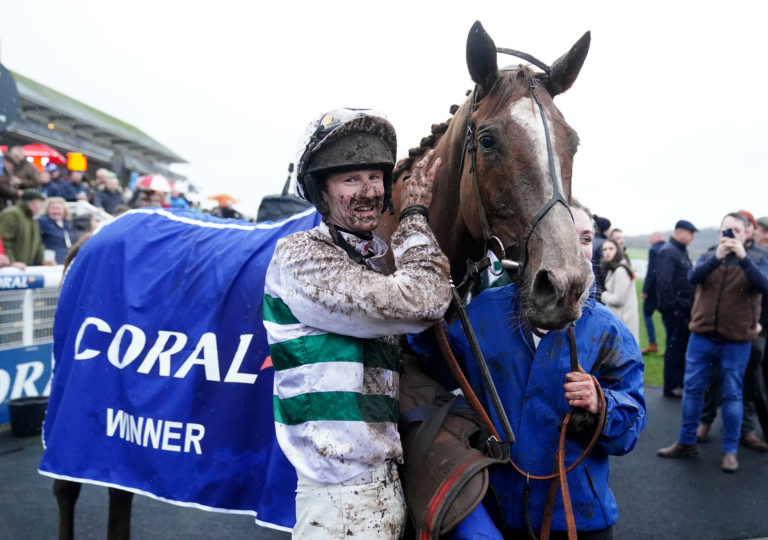Caoilin Quinn celebrates winning the Coral Welsh Grand National on Nassalam