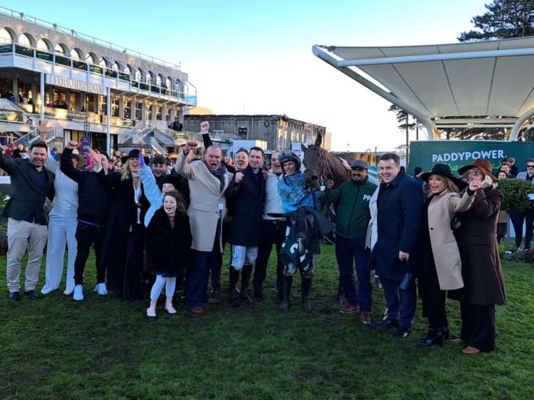 Meetingofthewaters with his delighted connections at Leopardstown