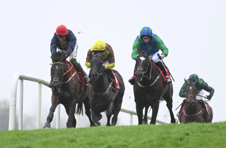 Fastorslow (red hat) had Galopin Des Champs and Bravemansgame behind him at Punchestown
