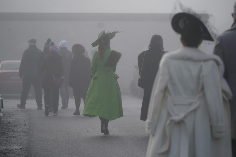 Racegoers depart after the remainder of the Naas card was cancelled