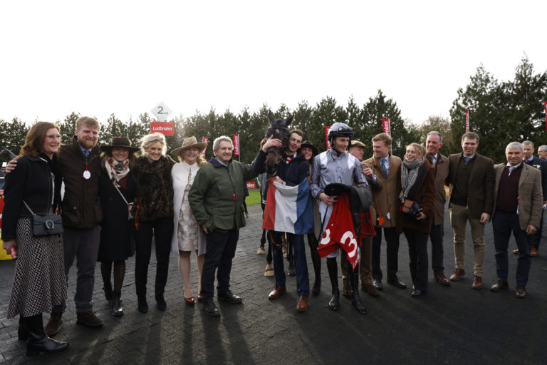 Connections with Il Est Francais and jockey James Reveley at Kempton