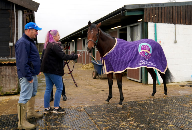 Big Evs with trainer Mick Appleby and head girl Tara Belfield at his Rutland yard