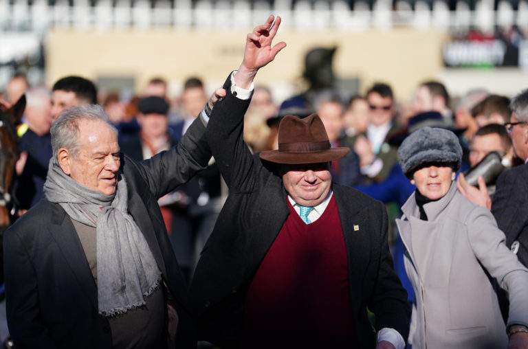 Nicky Henderson celebrates with owner Michael Buckley (left) at Cheltenham last year