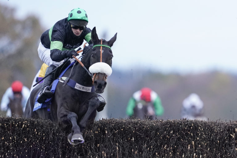 David Bass and First Flow winning the Coral Hurst Park Handicap Chase at Ascot