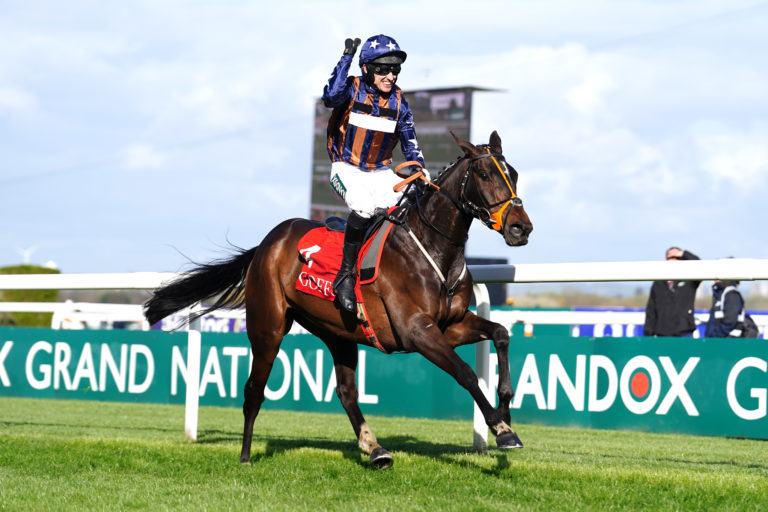 Paddy Brennan celebrates on Dysart Enos at last year's Grand National meeting