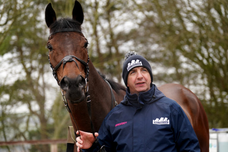 Fergal O'Brien stands with Crambo during a visit to his yard at Ravenswell Farm