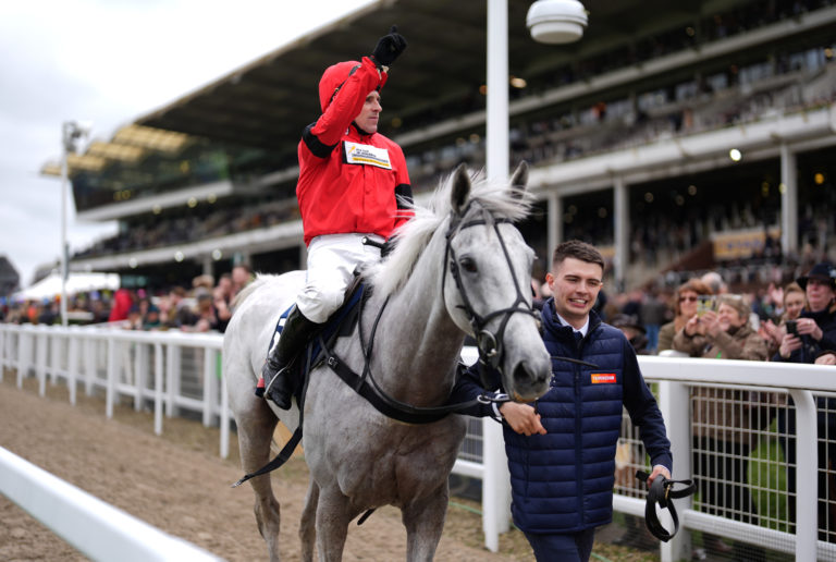 Harry Skelton salutes the Cheltenham crowd aboard Grey Dawning