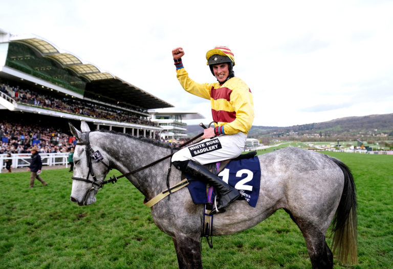 Jockey John Dawson celebrates on Sine Nomine after winning at Cheltenham