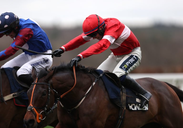 Crambo (right) defeating Paisley Park in the Long Walk Hurdle at Ascot