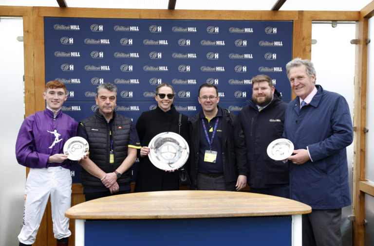 David Egan and trainer Dominic Ffrench Davis (right) with other winning connections