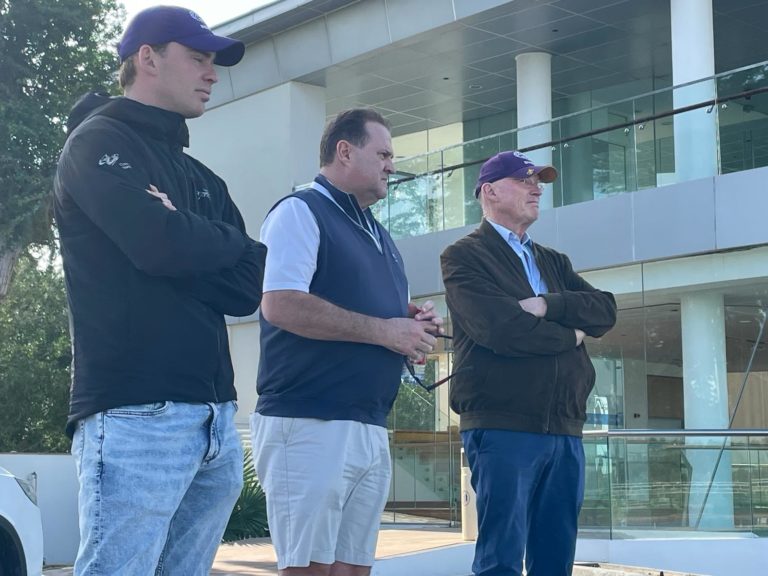 Thady Gosden (left) and John Gosden (right) watch on in Dubai