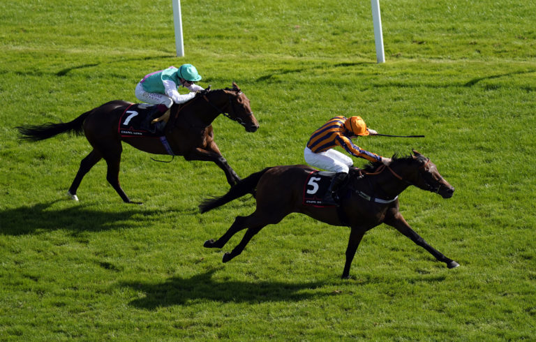 Dancing Gemini (right) in action at Doncaster