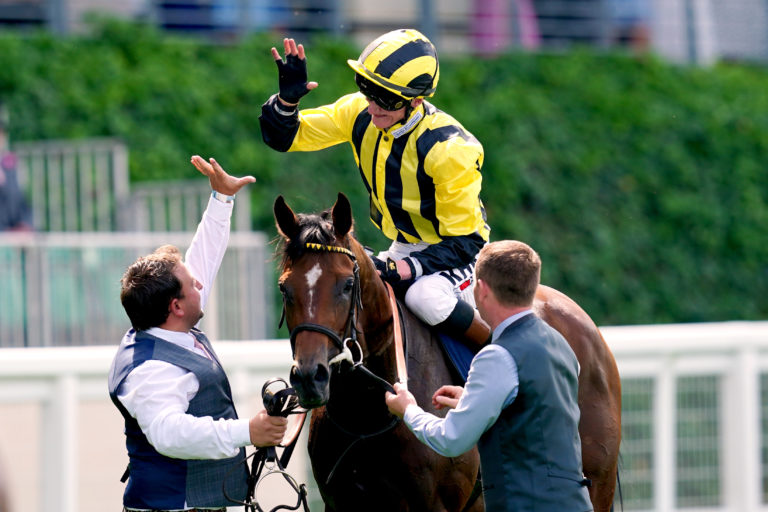 David Egan celebrates on board Eldar Eldarov after winning the Queen's Vase at Royal Ascot in 2022