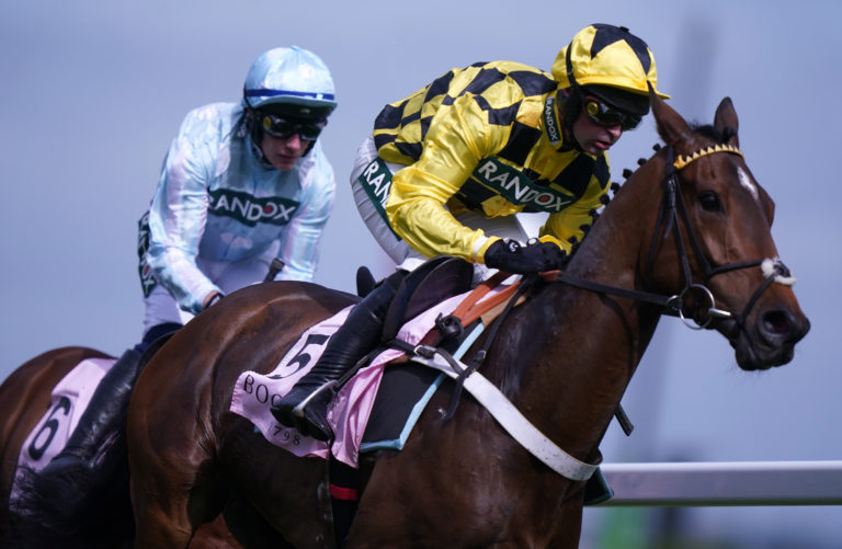 Kargese (left) chases home Sir Gino