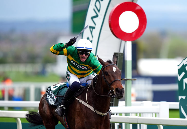 Paul Townend punches the air after I Am Maximus wins the Grand National 