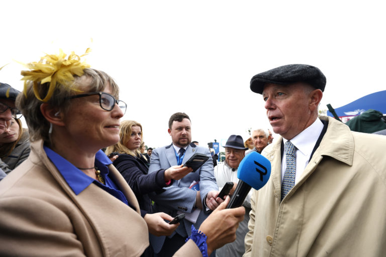 Trainer Karl Burke (right) will saddle three in the Hilary Needler