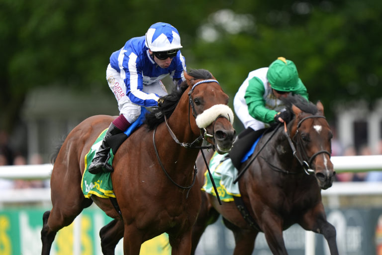 Sergeant Wilko (left) on his way to victory at Newmarket 