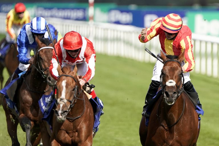 Tom Marquand celebrates winning his first Classic on Galileo Chrome