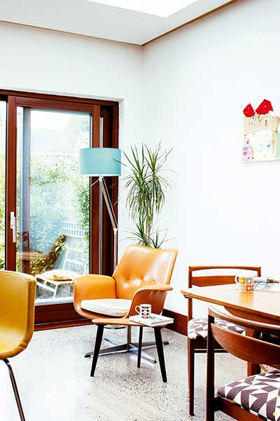 mid century seating in kitchen extension