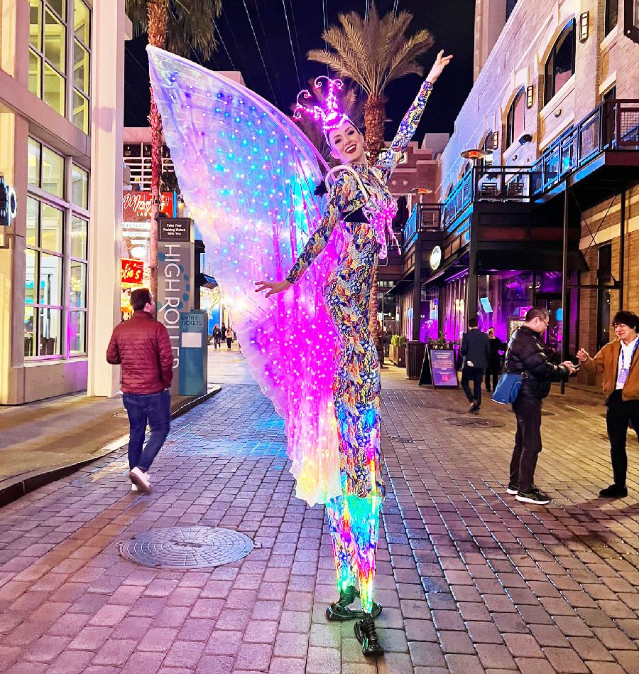 LED Flower and Butterfly Stilt Walkers Illuminate Las Vegas Promenade