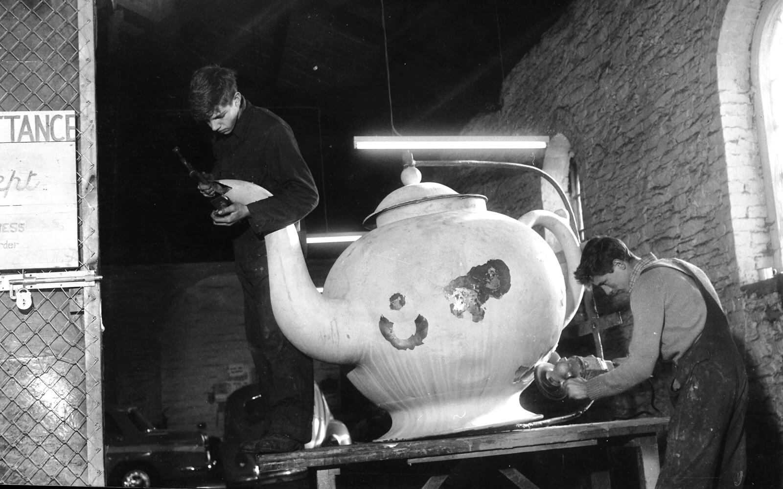 Repairing-teapot1 Golden teapot sign, repair 1963, Derry/ Londonderry,photo courtesy of Derry Journal