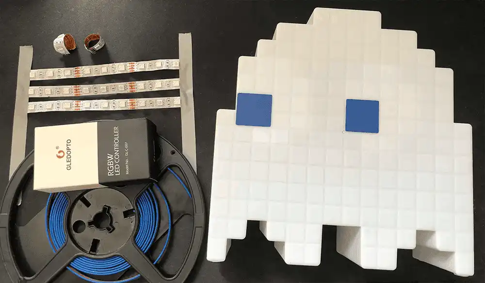 Photograph of PAC-MAN Ghost, LED Tape, and Gledopto Zigbee Controller box.