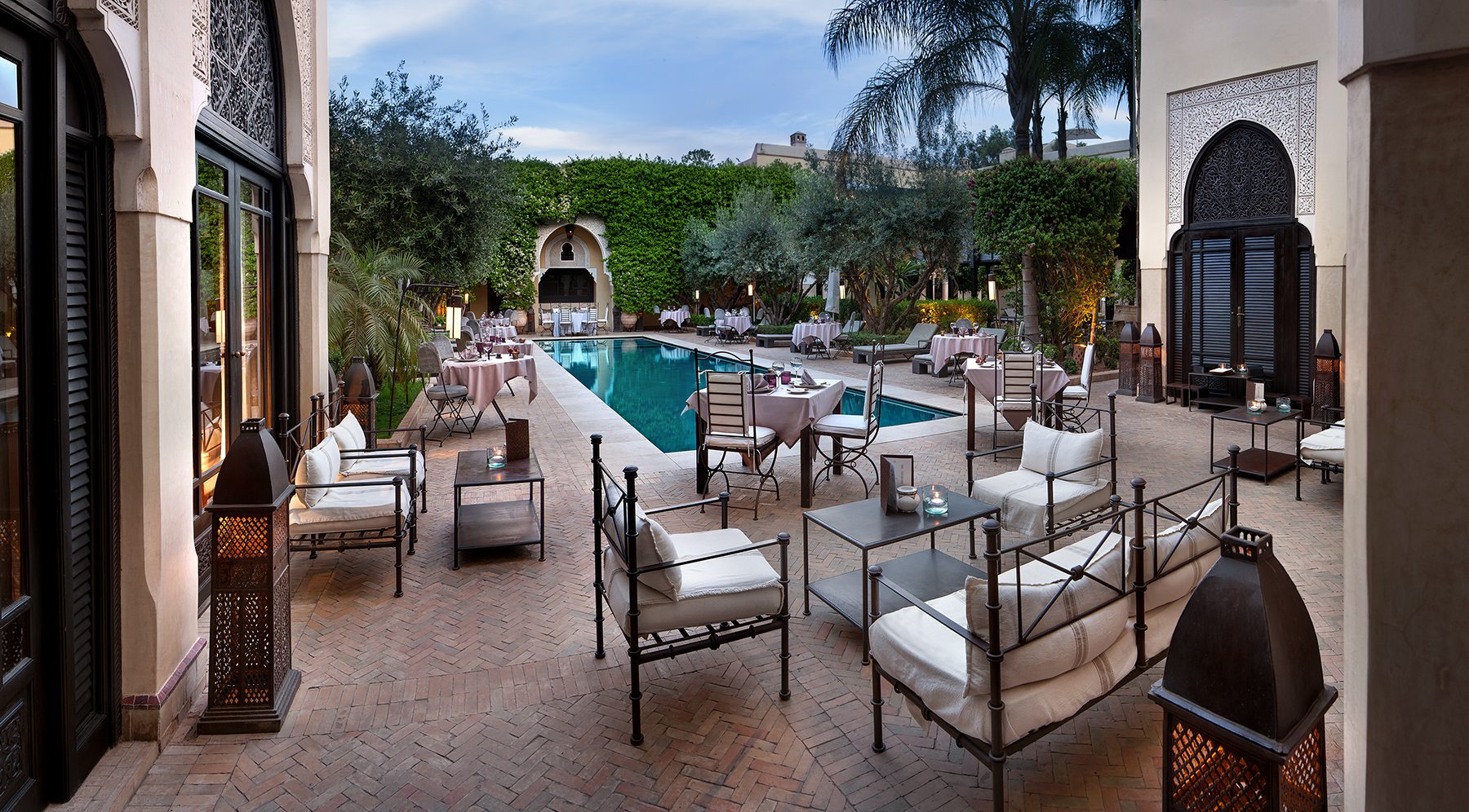 Dinner by the pool Villa des Orangers