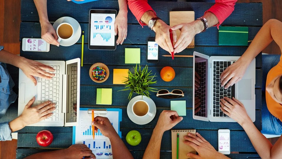 People working sales and marketing working together