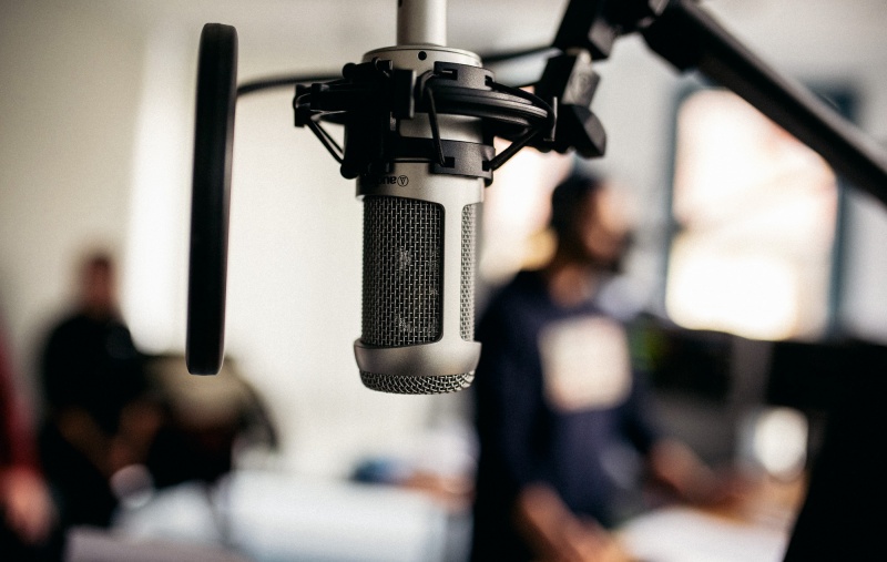 A recording microphone set up in a studio