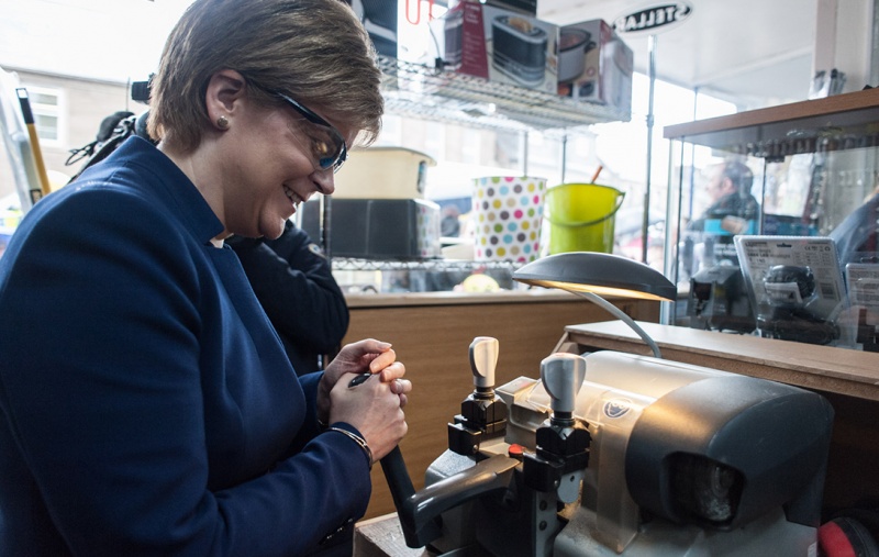 Nicola Sturgeon operating machinery