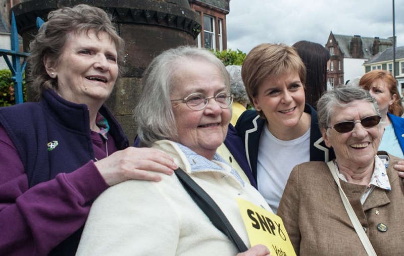 Nicola Sturgeon on the campaign trail with three older women supporters