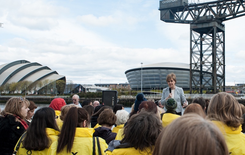 Nicola Sturgeon speaking to activists by the Clyde, with the Hydro and SEC in the background