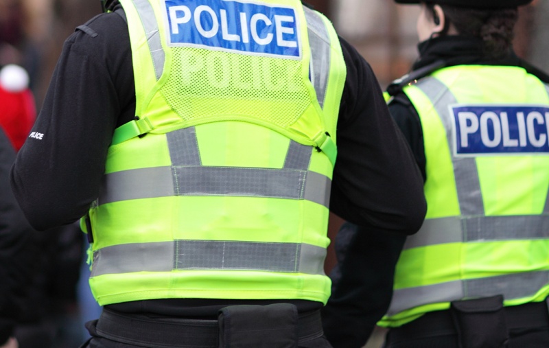 Police officers viewed from the back