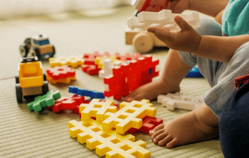 Baby playing with toys