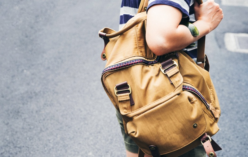 young person wearing a backpack