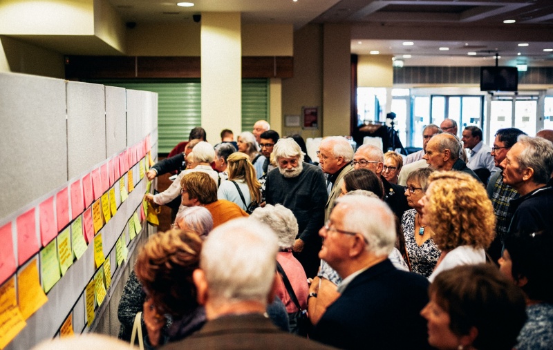 SNP members gather round the wall of conversations at the National Assembly in Ayr
