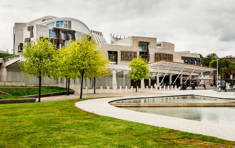 The Scottish Parliament in Edinburgh on an overcast day.