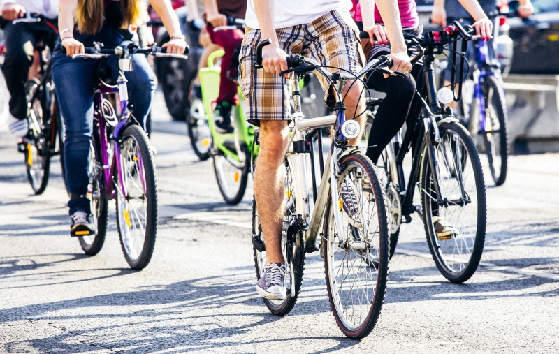 cyclists on the street at summer
