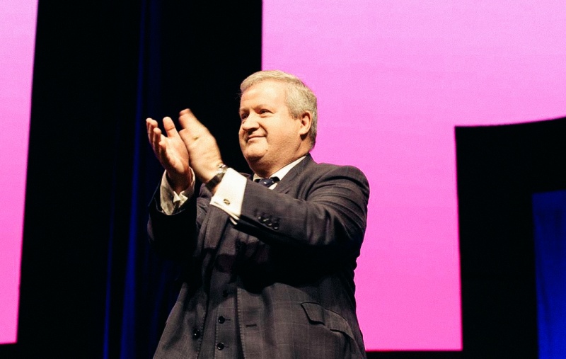 Ian Blackford applauding the crowd at Conference